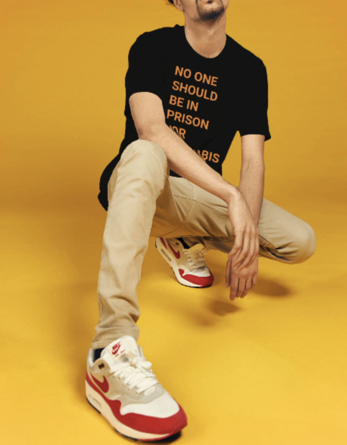 Community wearing 40 Tons tees on the street at golden hour